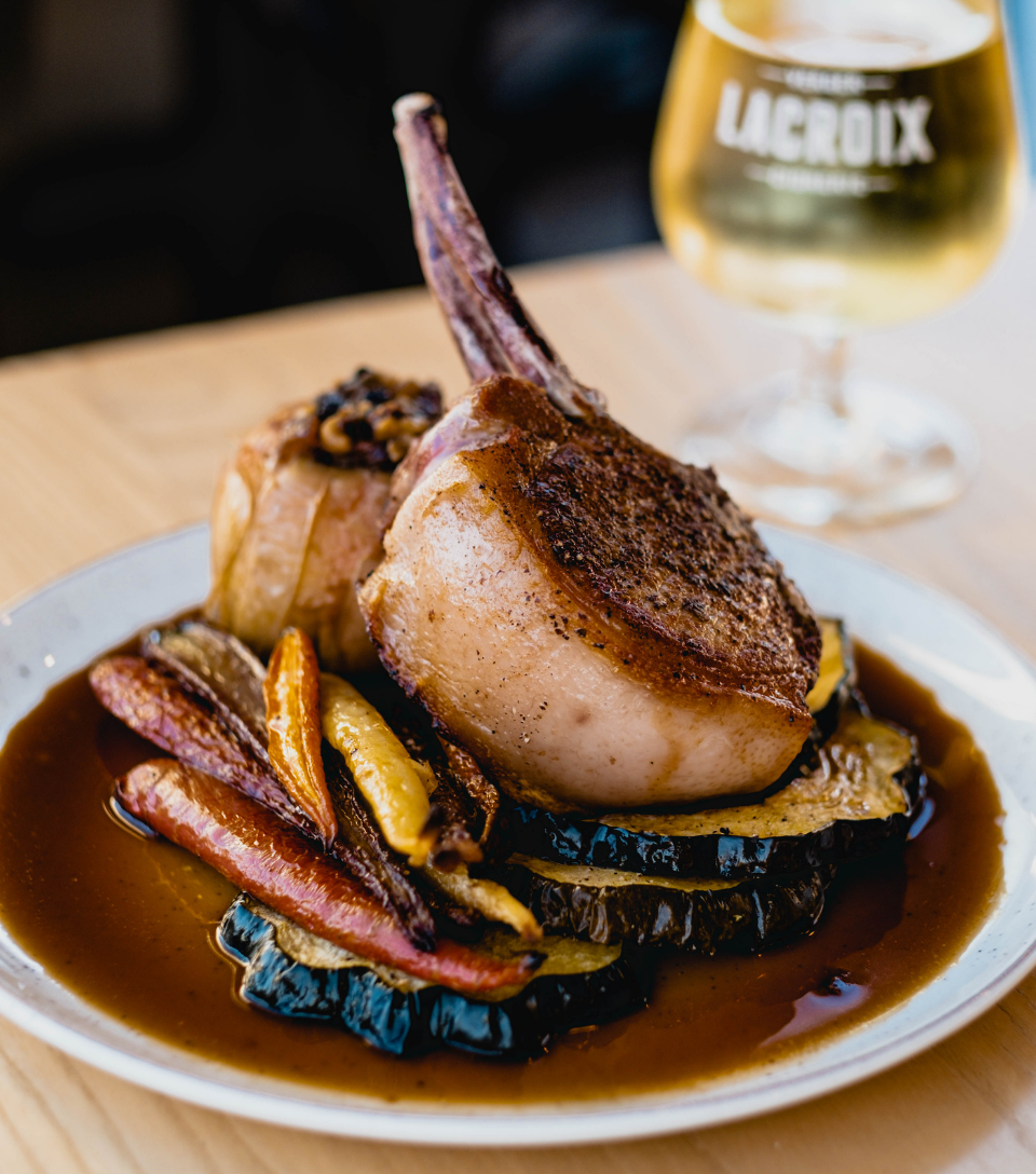 Roasted Suckling Pig Loin with Candied Fruit–Stuffed Apple