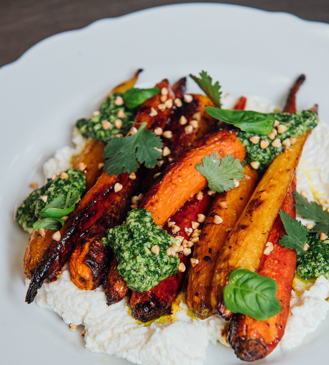 Glazed Nantes Carrots with Buckwheat Honey, Herb Pistou, and Homemade Ricotta